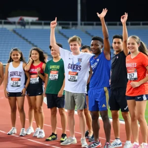 High school athletes celebrating at a track and field competition in Texas